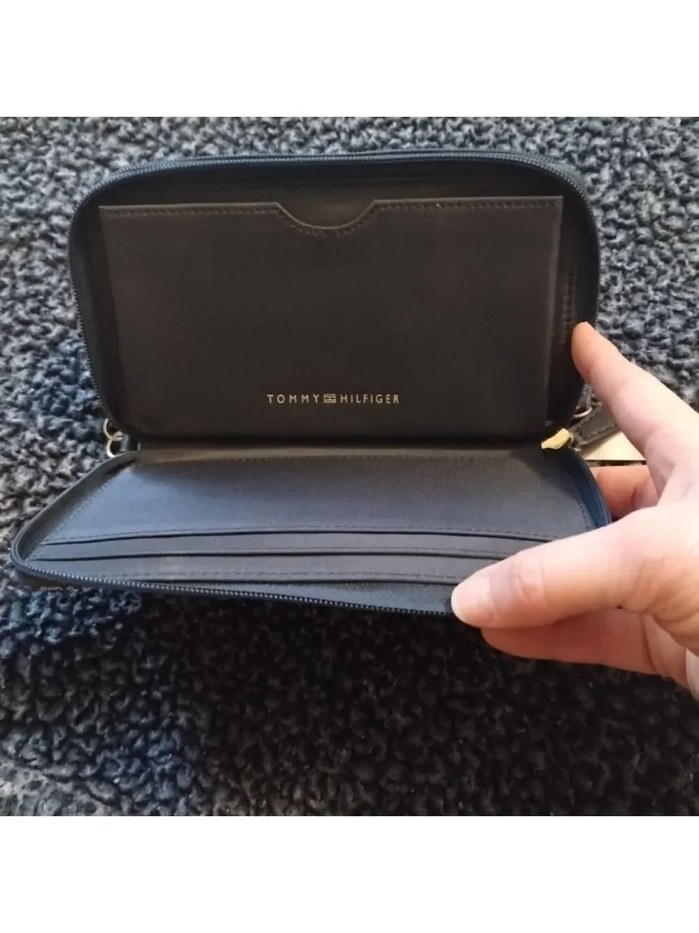 Tommy Hilfiger Full Zip Around Wallet features credit card slots